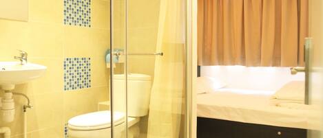 Standard Double Room | Bathroom | Shower, free toiletries, hair dryer, slippers