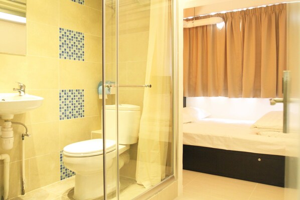 Standard Double Room | Bathroom | Shower, free toiletries, hair dryer, slippers