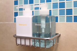 Shower, free toiletries, hair dryer, slippers