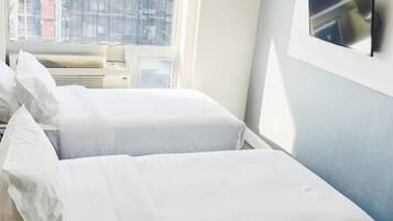 Double or Twin Room | 1 bedroom, iron/ironing board, free WiFi, bed sheets