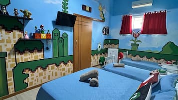 Family Room, 1 Bedroom | Individually decorated, blackout drapes, free WiFi, bed sheets