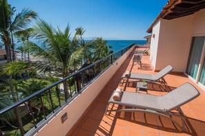 Luksussuite | Oppholdsområde | Flatskjerm-TV og iPod-dokkingstasjon