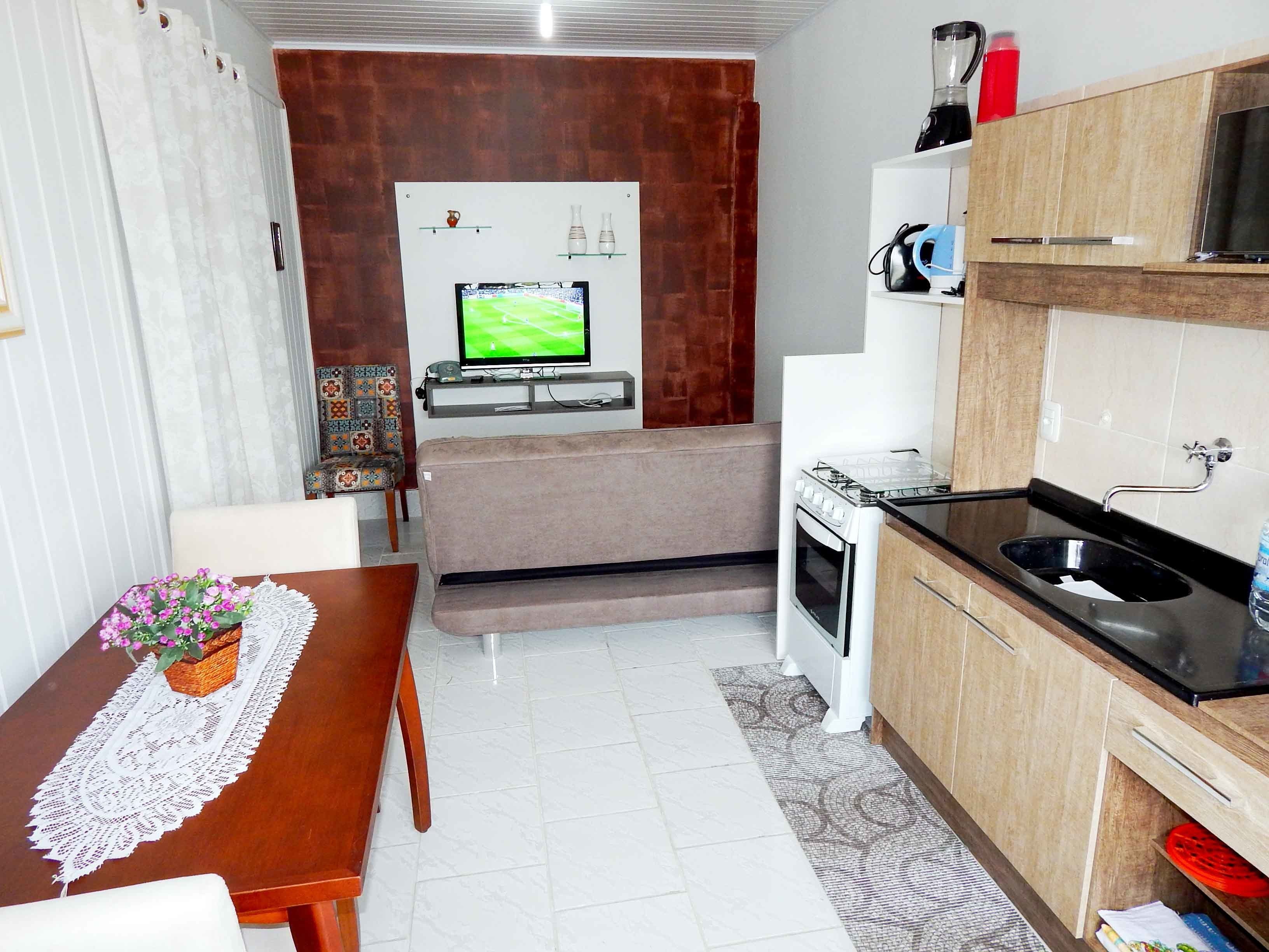Apartamento família, 2 quartos | Cozinha privada | Geladeira, micro-ondas, cooktop, cafeteira/chaleira