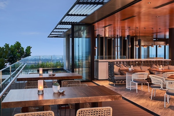 Rooftop bar, pool views, open daily