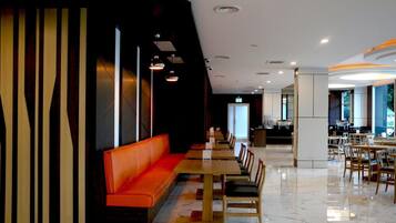 Breakfast, lunch, dinner served; local and international cuisine