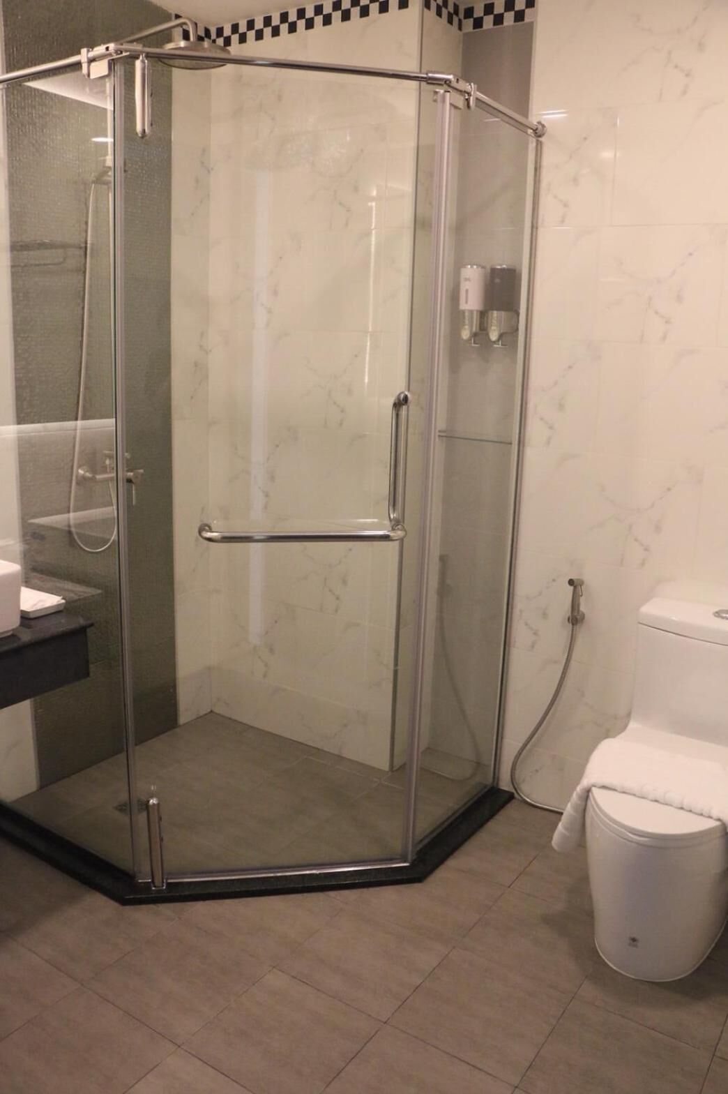 shower, free toiletries, hair dryer, towels