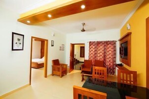 Family Apartment, 1 Bedroom | Living room | Flat-screen TV