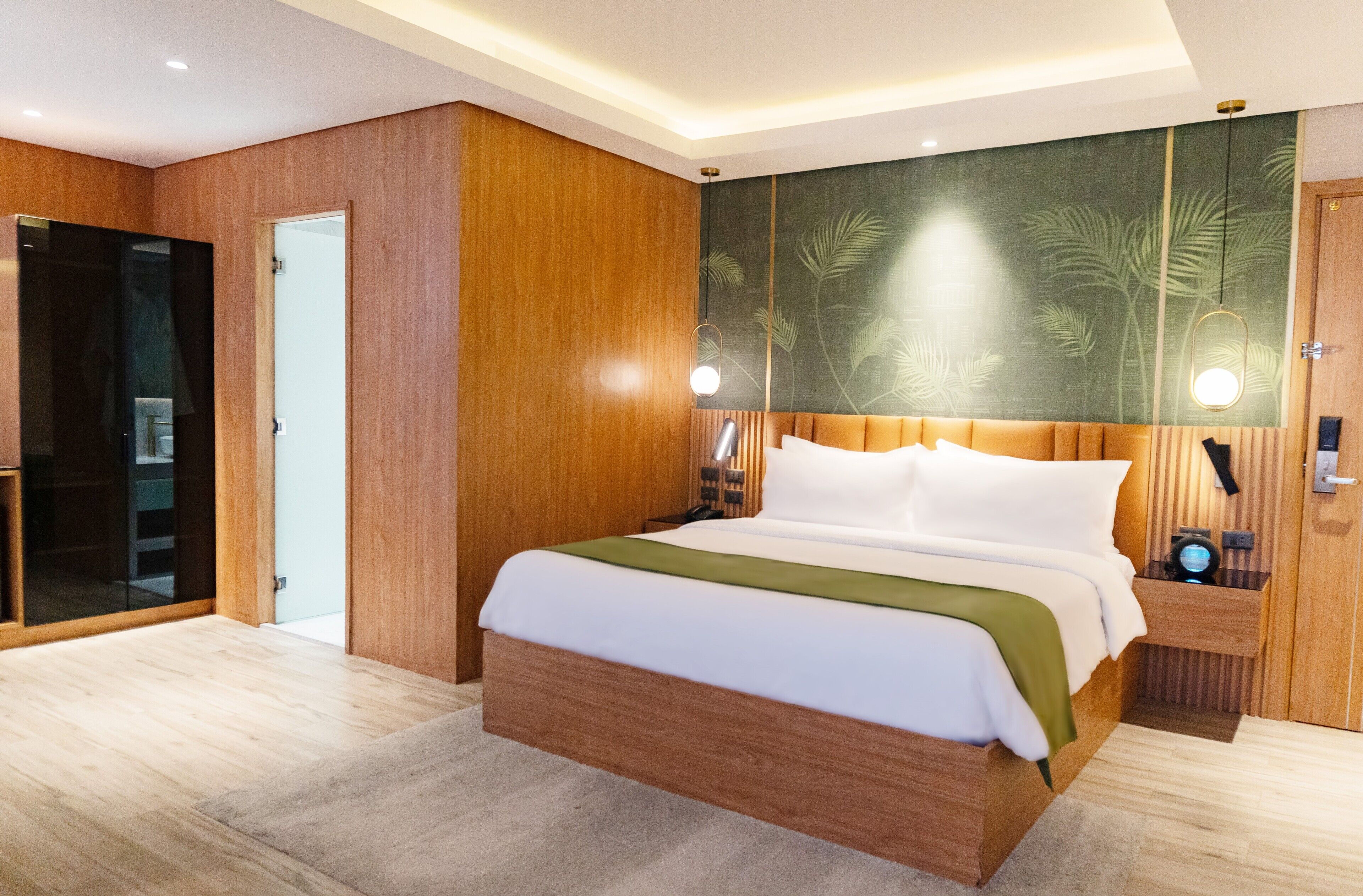 signature suite, 1 king bed, city view | minibar, in-room safe, iron/ironing board, free wifi