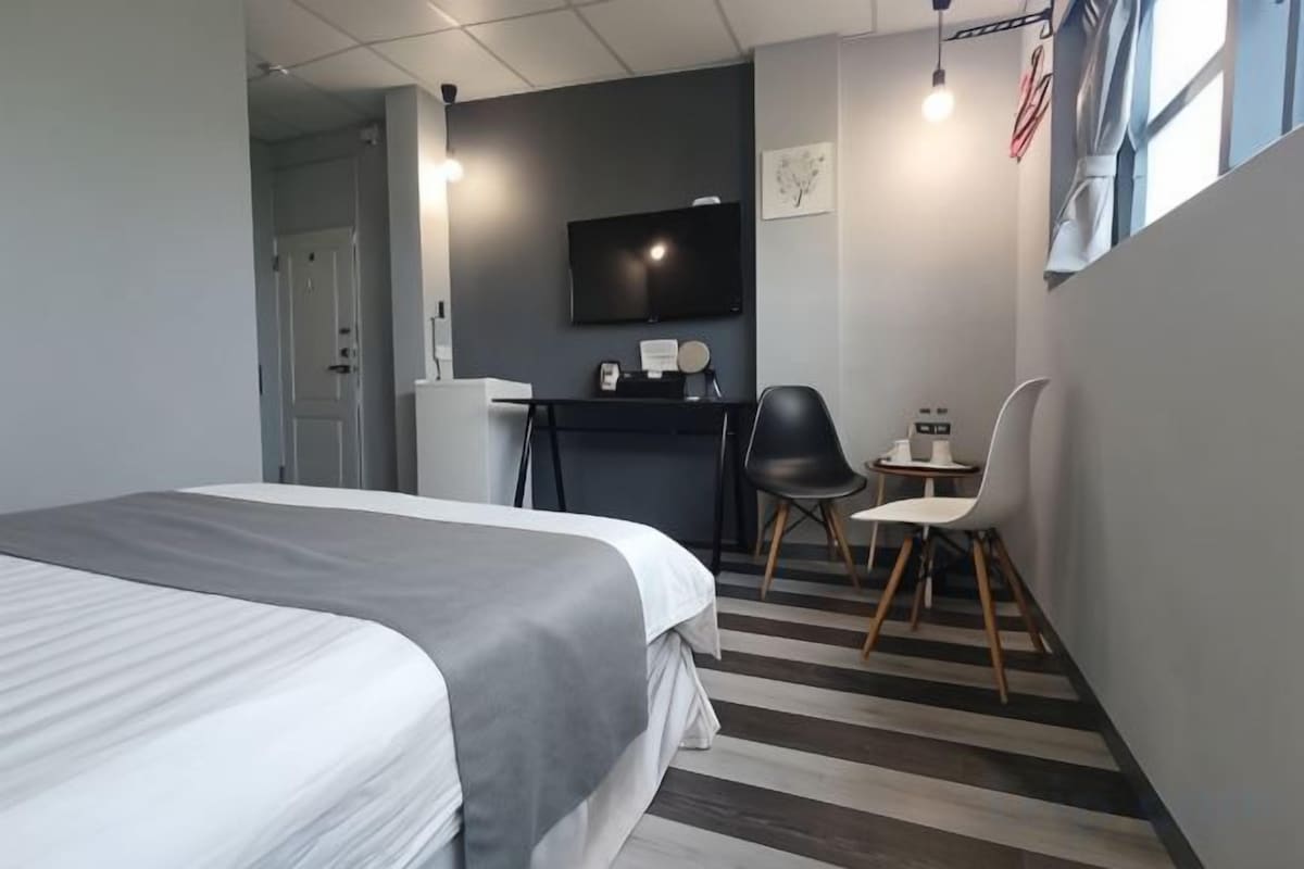 Desk, blackout curtains, free WiFi, bed sheets