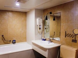 Combined shower/tub, free toiletries, hair dryer, bathrobes