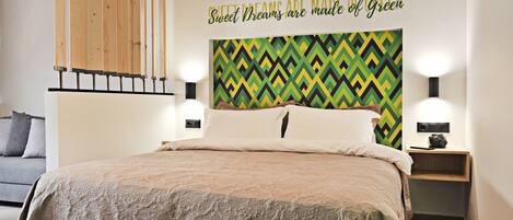 Deluxe Studio (Green) | Premium bedding, individually decorated, individually furnished, desk
