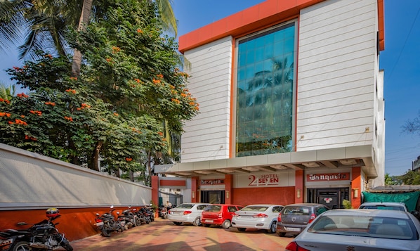 2 Hotel Seyen offers a sleek, modern design with a glass facade reflecting the surroundings.