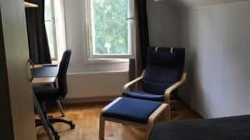 Desk, laptop workspace, blackout drapes, soundproofing