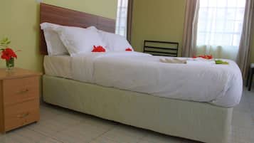 Minibar, desk, bed sheets