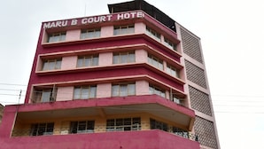 A multi-story building with the sign "MARU B COURT HOTEL" at the top. - Maru B Courts Hotel (Nyeri)
