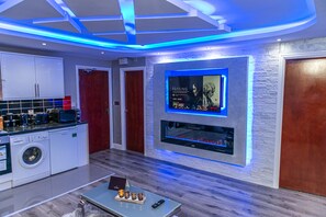 Apartamento ejecutivo, baño privado (Executive One Bedroom) | Salón