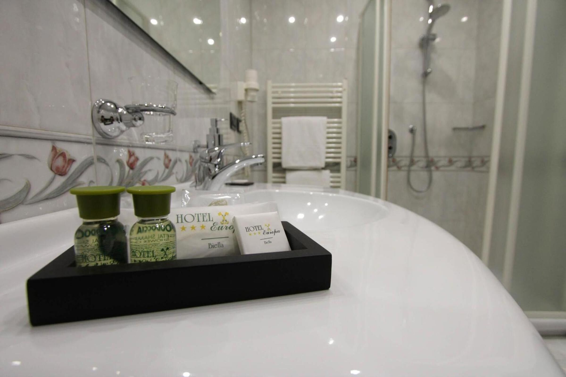 shower, designer toiletries, hair dryer, bidet