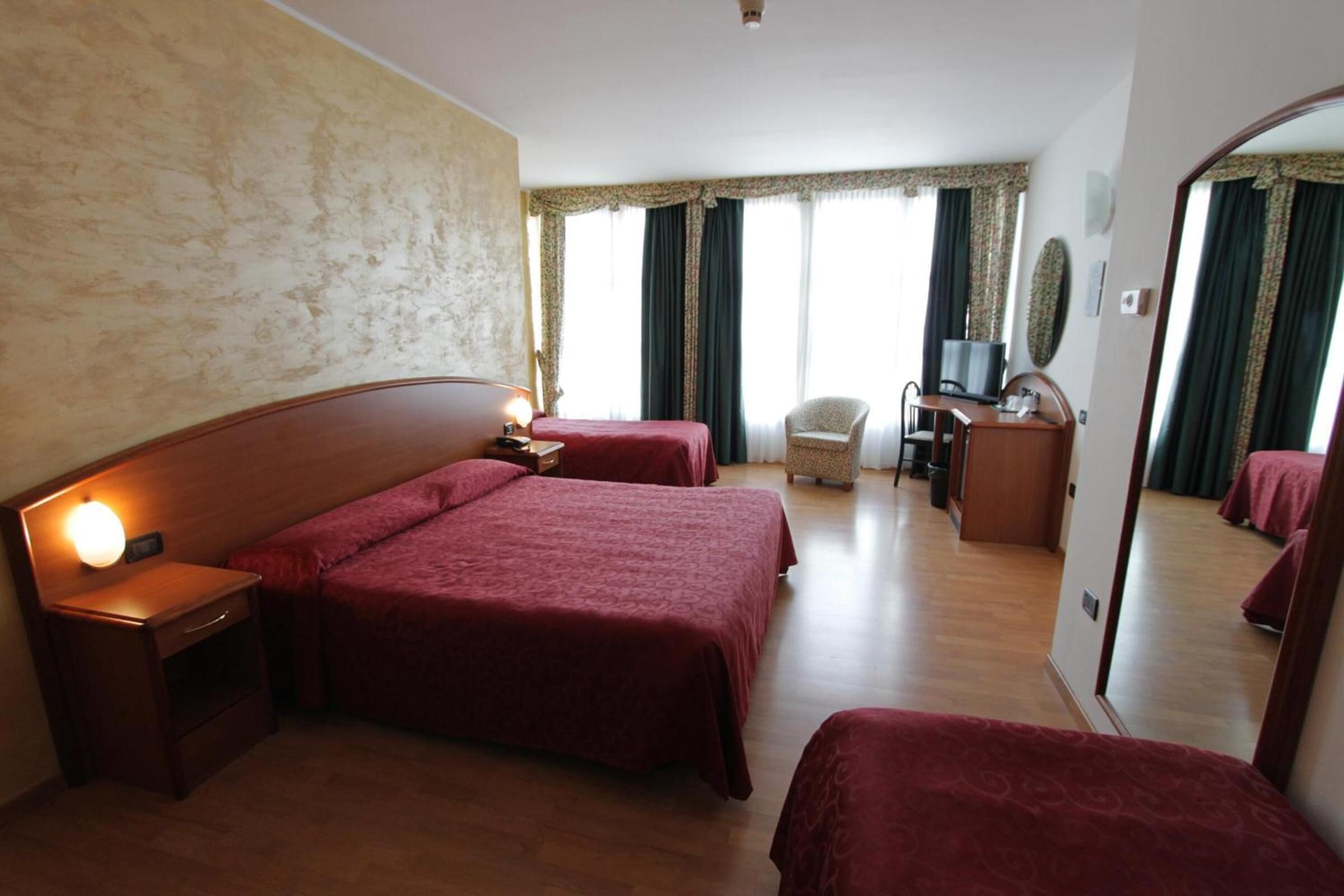 premium bedding, minibar, desk, free cots/infant beds