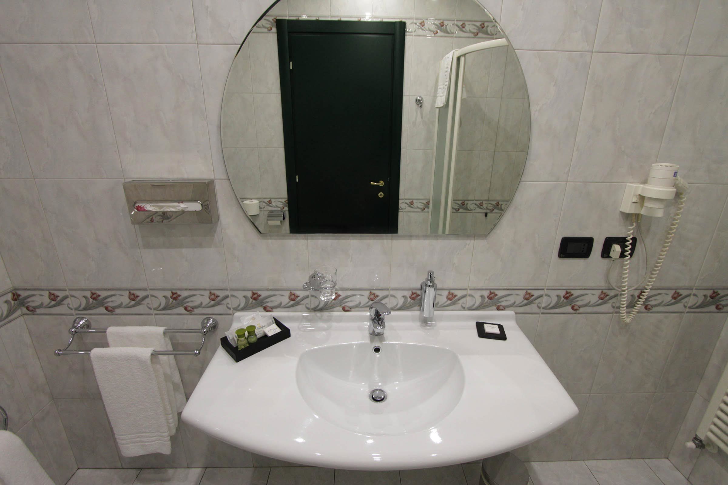 shower, designer toiletries, hair dryer, bidet