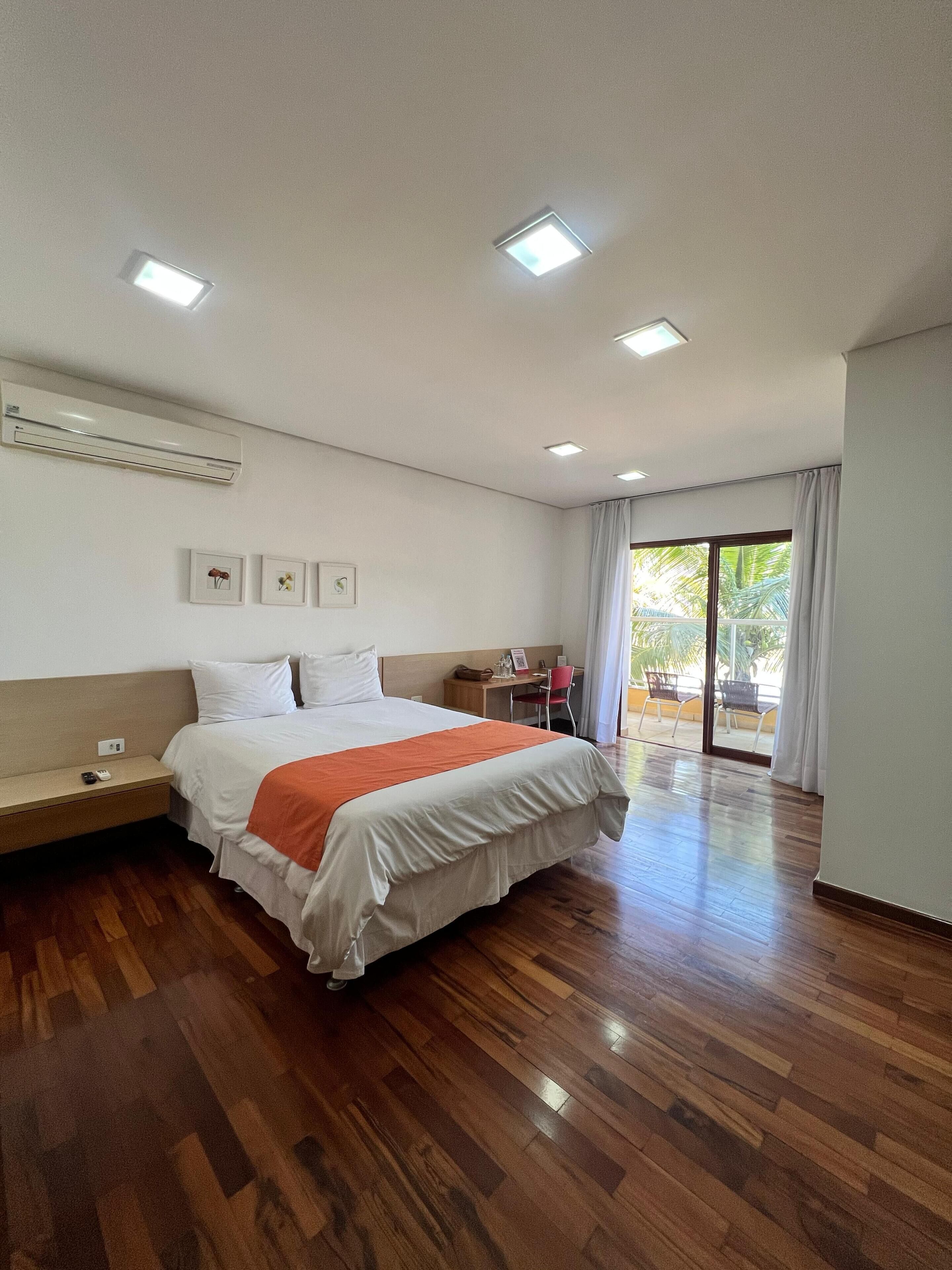 Standard Double Room | Minibar, in-room safe, individually decorated, individually furnished