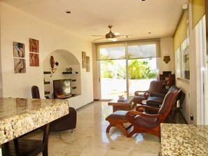 Deluxe Penthouse, 2 Bedrooms, Private Bathroom, Partial Ocean View | Living area | Flat-screen TV, DVD player - BOSQUE DE LOS ALUXES TROPICAL BY PLAYA PARADISE (Playa del Carmen)