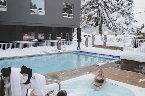 Outdoor pool, open 8:00 AM to 10:00 PM, pool umbrellas, sun loungers