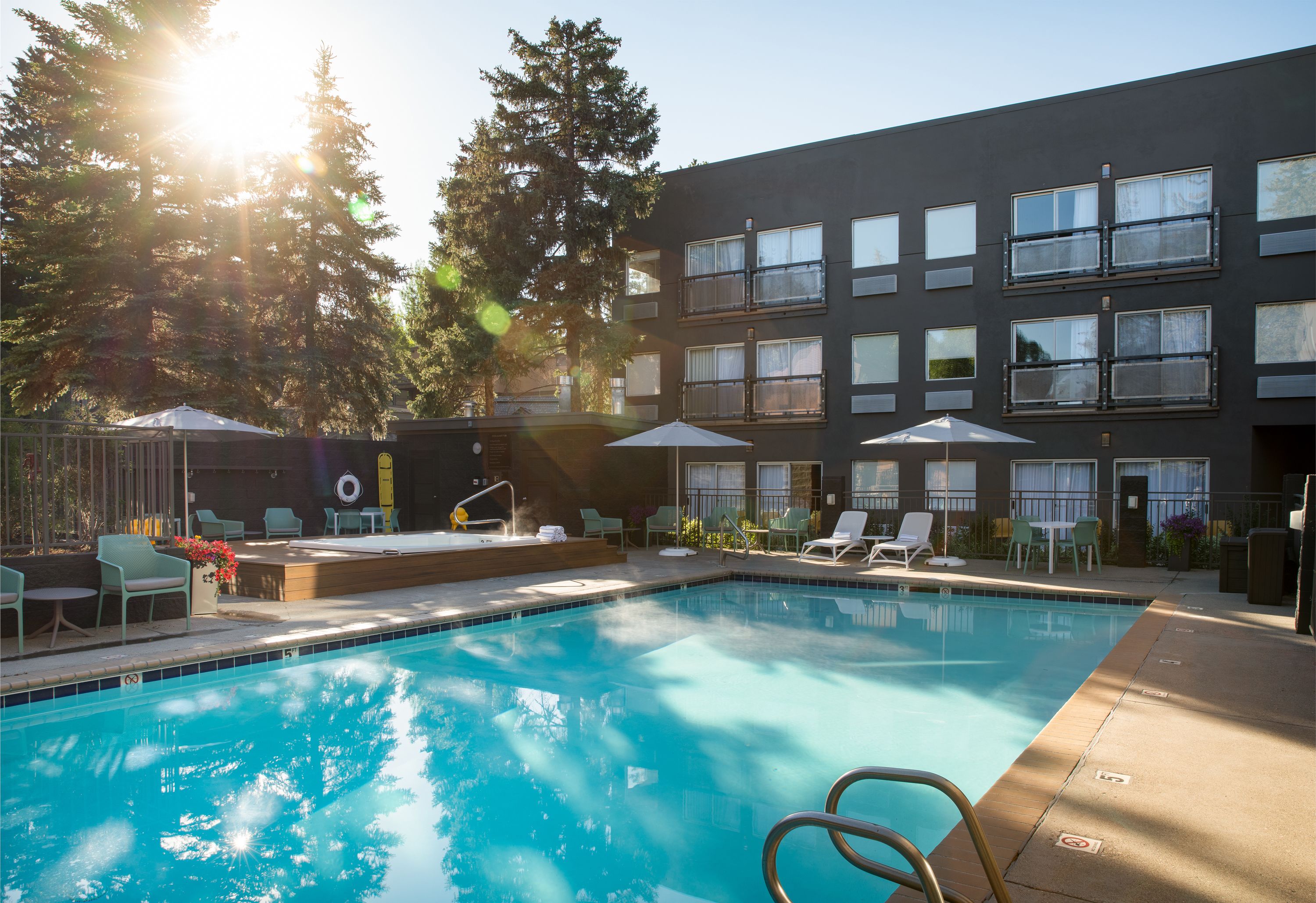 outdoor pool, open 8:00 am to 10:00 pm, pool umbrellas, pool loungers