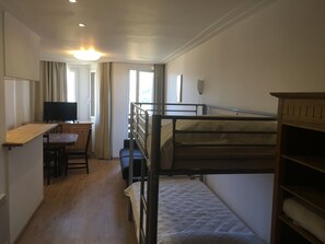 Estudio | Cortinas opacas y ropa de cama