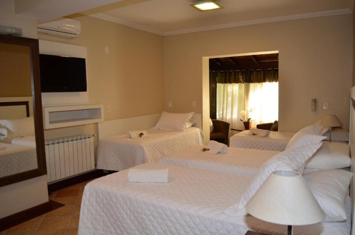 grand suite, patio, garden view | 1 bedroom, premium bedding, minibar, desk