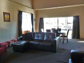House, 5 Bedrooms | Living area | Flat-screen TV