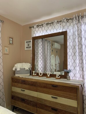 Shower, hair dryer, towels, shampoo