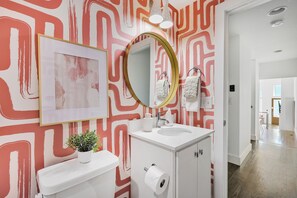 Combined shower/tub, hair dryer, towels, soap