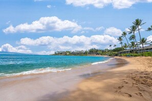 On the beach, sun-loungers, beach towels
