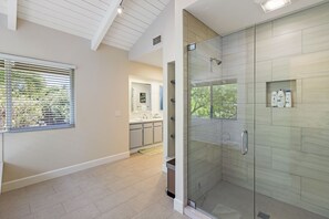 Bathtub, hair dryer, towels, soap