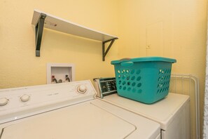 Washer and dryer with drying rack