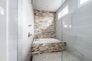 Bathtub, hair dryer, towels