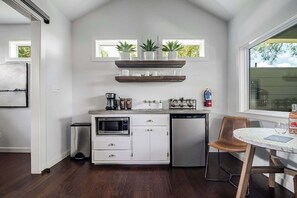 Fridge, microwave, coffee/tea maker, toaster