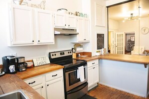 Fridge, microwave, oven, stovetop - The Farmhouse Loft "Greene County's Guesthouse" (Carrollton)