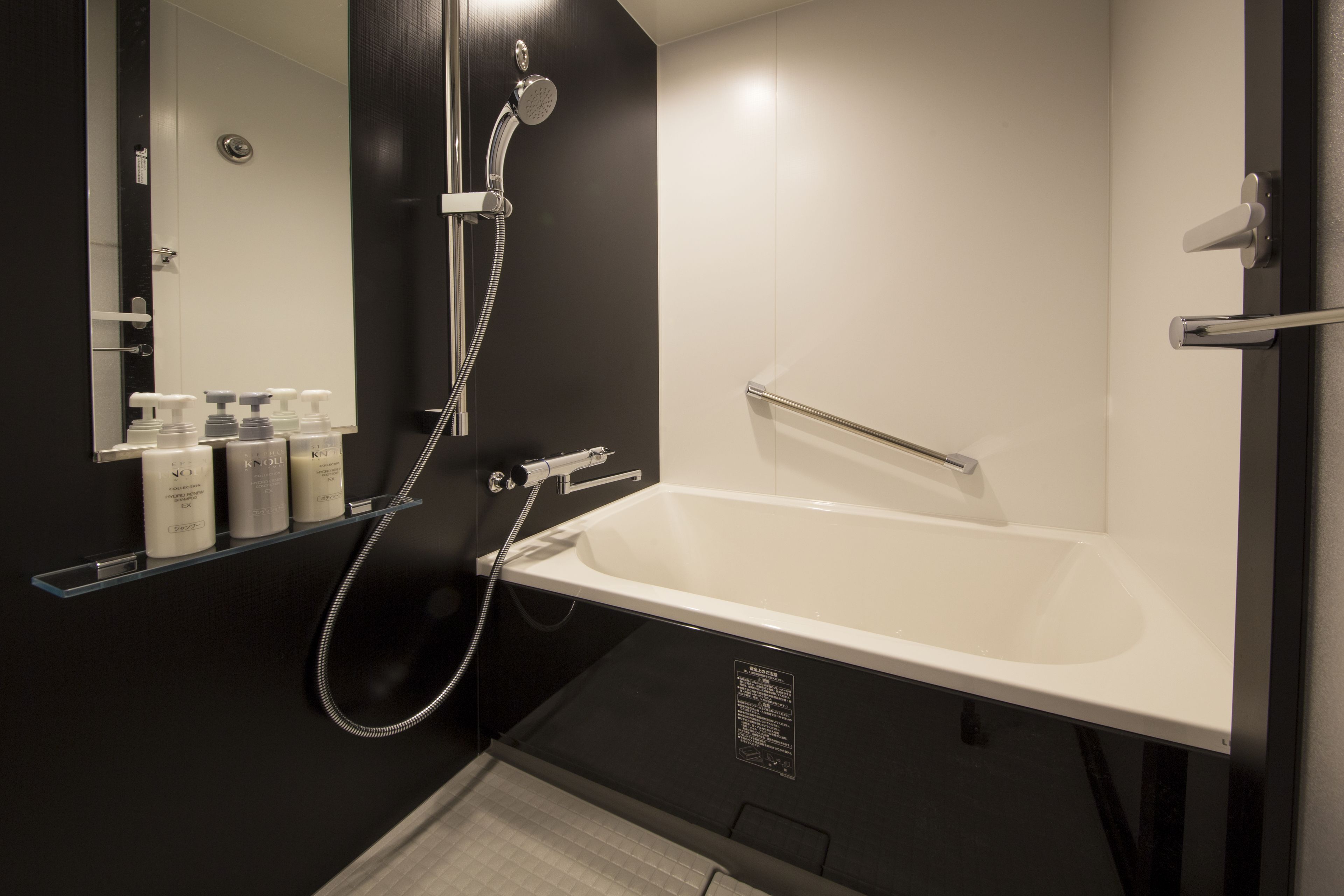 separate bathtub and shower, free toiletries, hair dryer, slippers