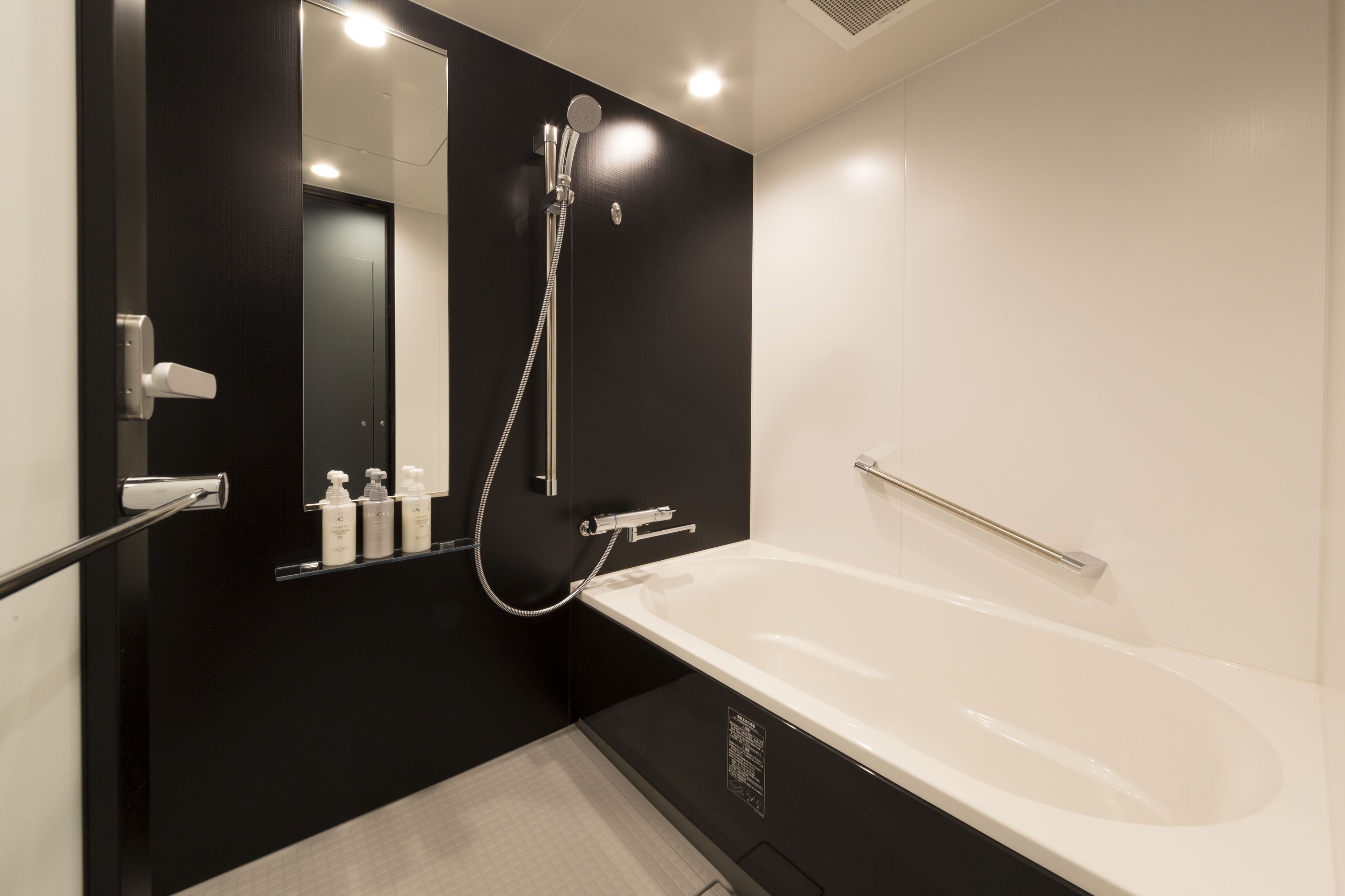 separate bathtub and shower, free toiletries, hair dryer, slippers