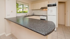 Apartment, 2 Bedrooms | Private kitchen | Coffee/tea maker, full-size fridge, microwave, oven - Sunset Waters 6 (Whitsundays)