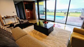 Family Twin Room | Living area | Flat-screen TV