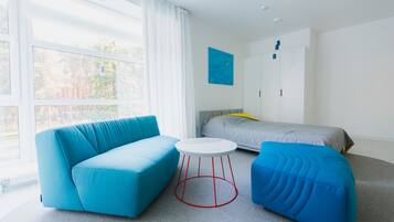 Premium bedding, memory-foam beds, desk, laptop workspace