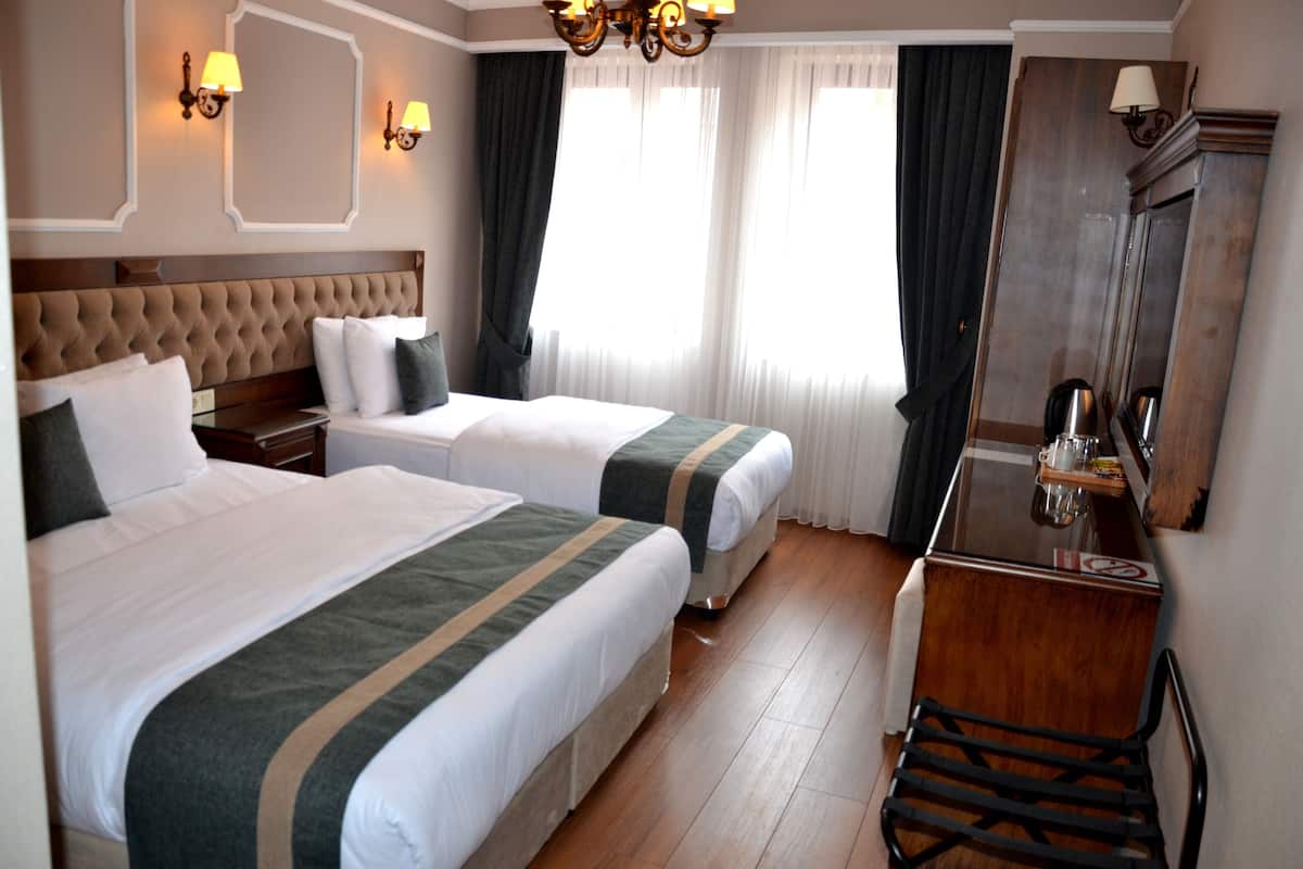 Luxe beddengoed, een kluis op de kamer, individueel gedecoreerd