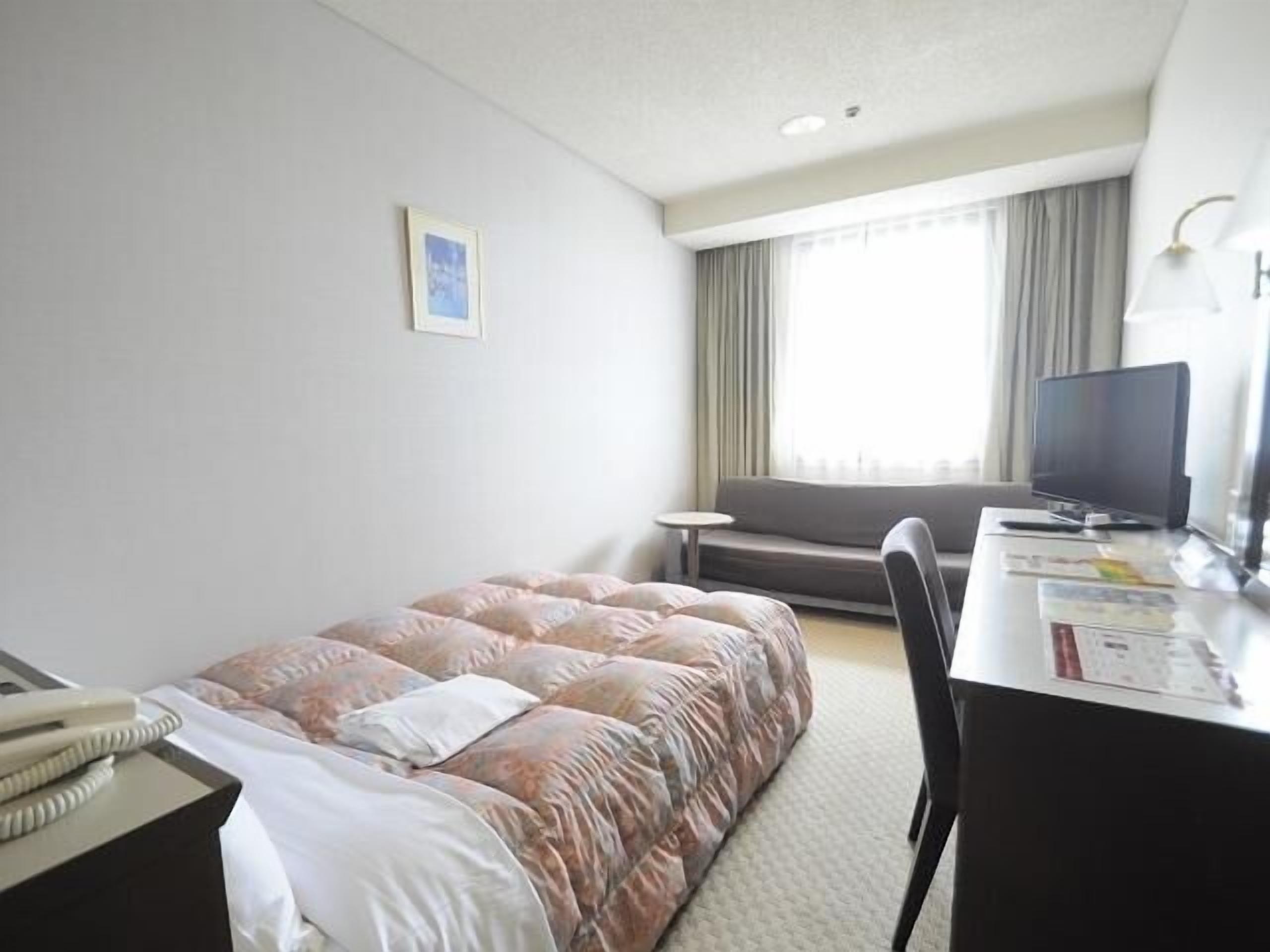 Desk, iron/ironing board (on request), free WiFi, bed sheets