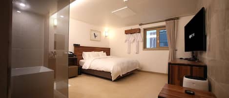 Premium bedding, down duvets, desk, laptop workspace