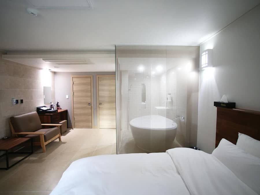 Premium bedding, down comforters, desk, laptop workspace