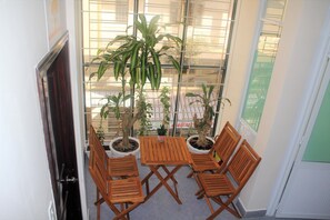 Suite, Non Smoking, City View | Living area | 32-inch Smart TV with satellite channels, TV - Winter Spring Homestay (Can Tho)