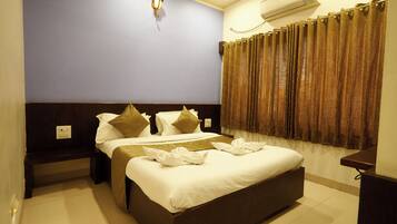 Habitación doble Deluxe | Caja de seguridad en la habitación y insonorización