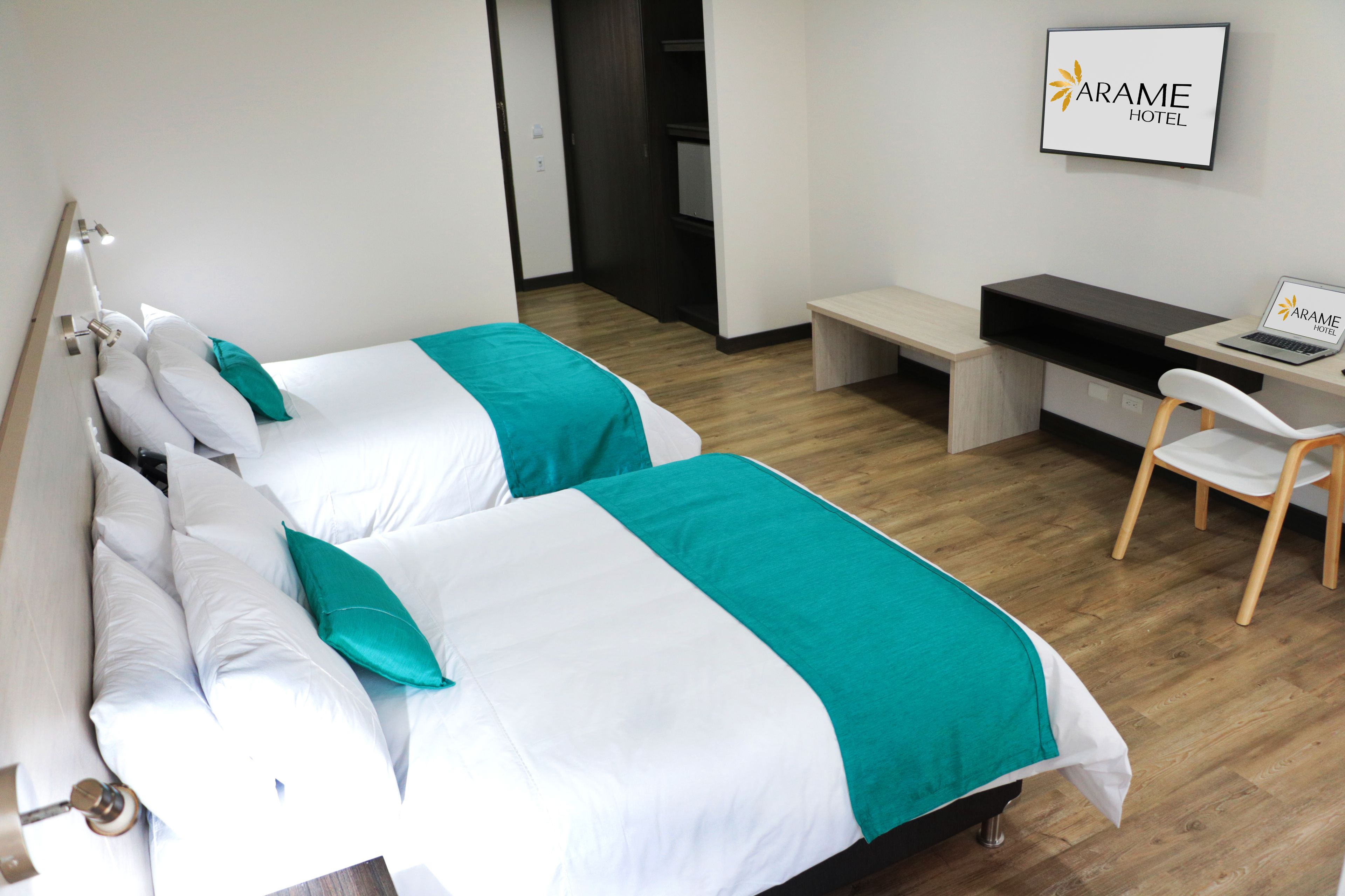 deluxe twin room, multiple beds, city view | premium bedding, minibar, in-room safe, desk